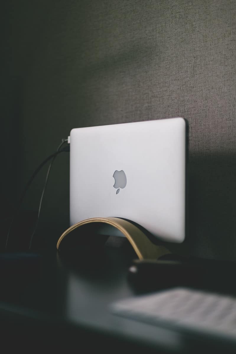 Apple MacBook on gray textile